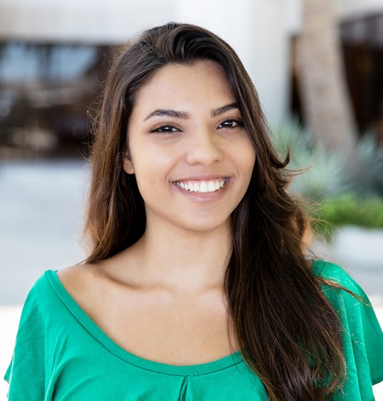 Young woman with dental crowns in Tucson