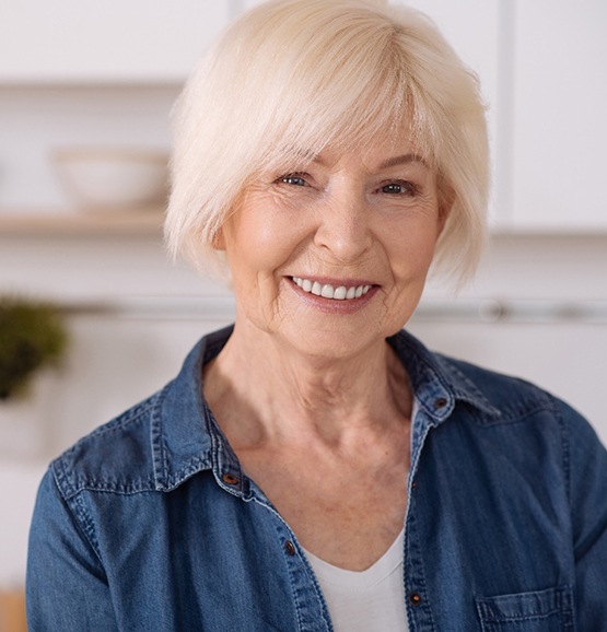 Woman with dentures in Tucson