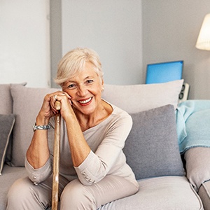 a woman in Tucson adjusting to her new dentures 