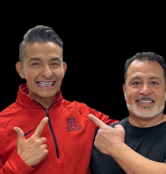 Patient smiling after procedures by Dr. Lopez