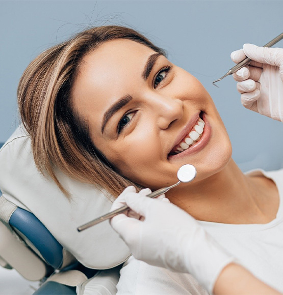 a patient in Tucson smiling during their dental visit