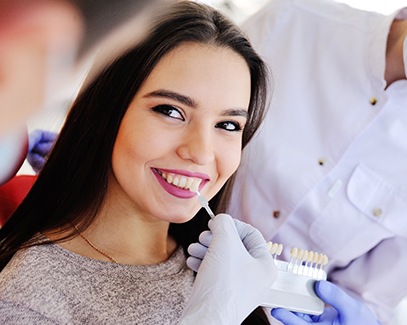 woman getting veneers in Tucson