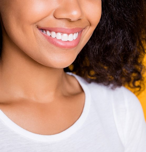 Woman with veneers in Tucson smiling