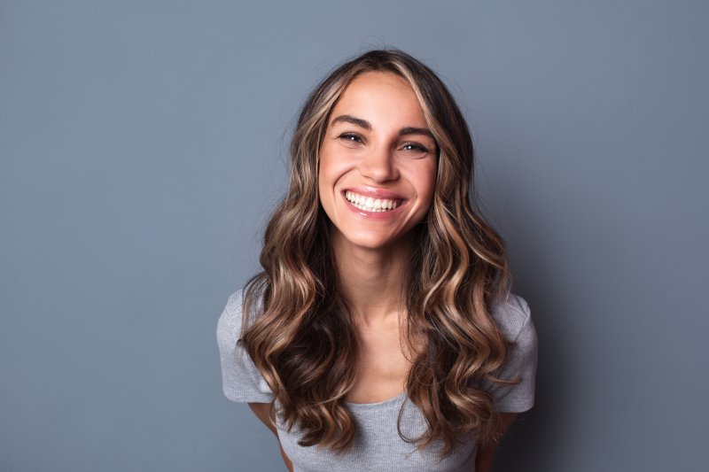 patient smiling with dental implants