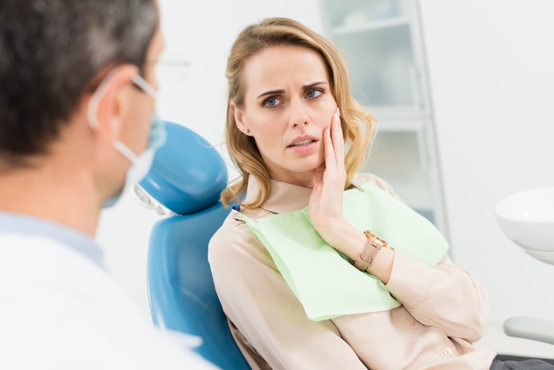 patient talking to a dentist