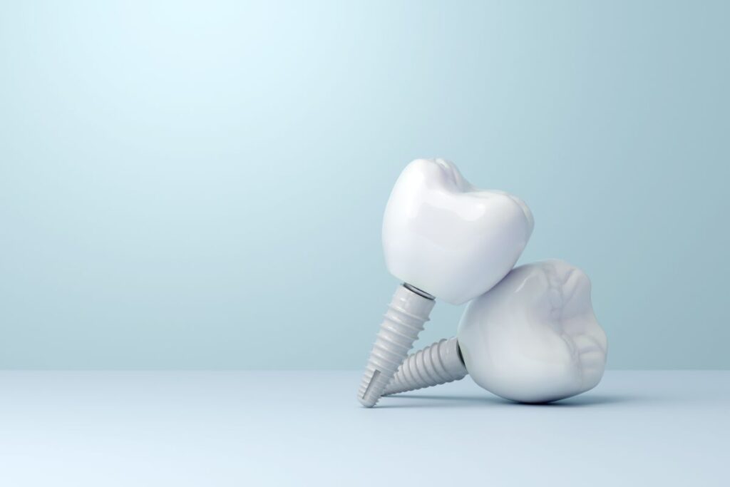 A CGI of two zirconia dental implants